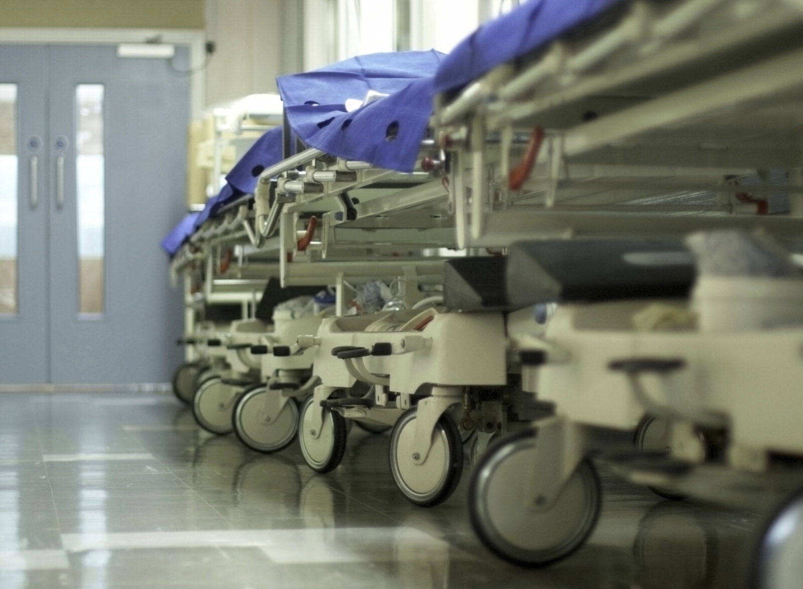 Hospital beds stacked in corridors due to lack of space and long waiting lists